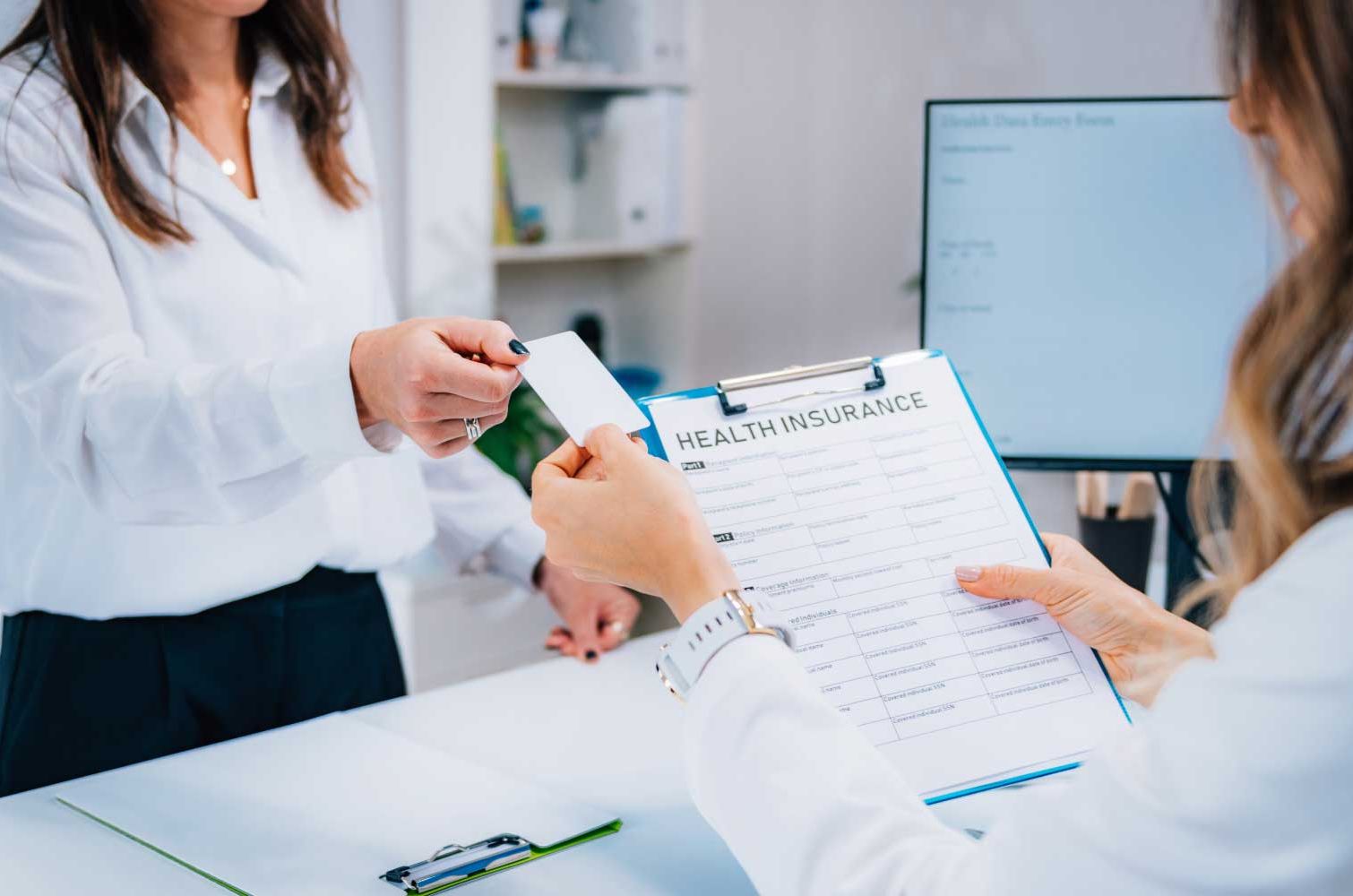 Clinician handling Client health insurance